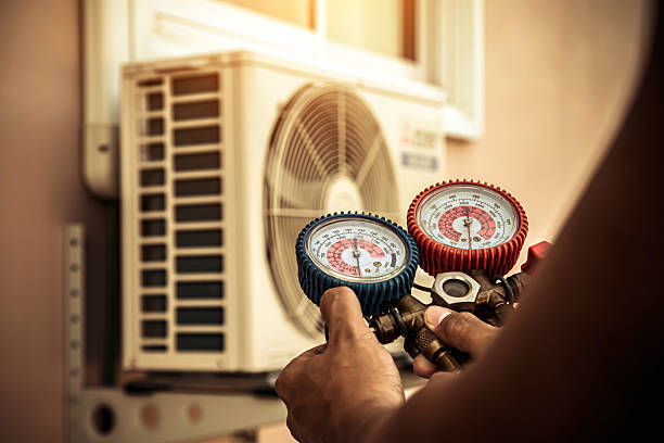 Professional Air Conditioning Service technician working in Shauck, OH